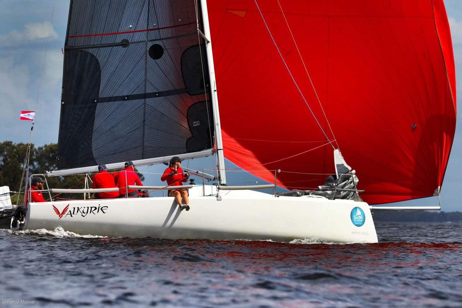 Fareast racing yacht sailing with a full crew