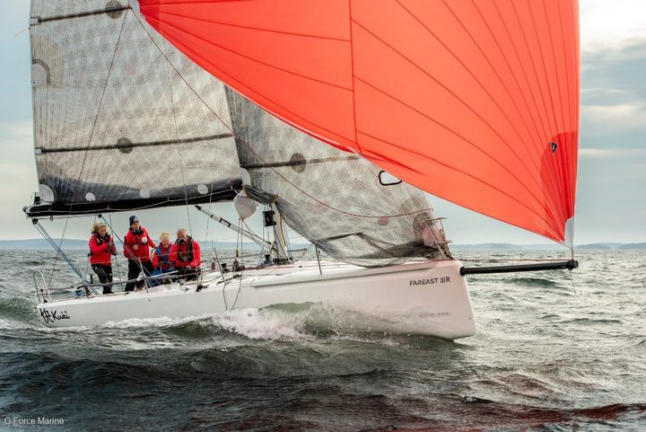 Fareast 31R sailing under a red spinnaker