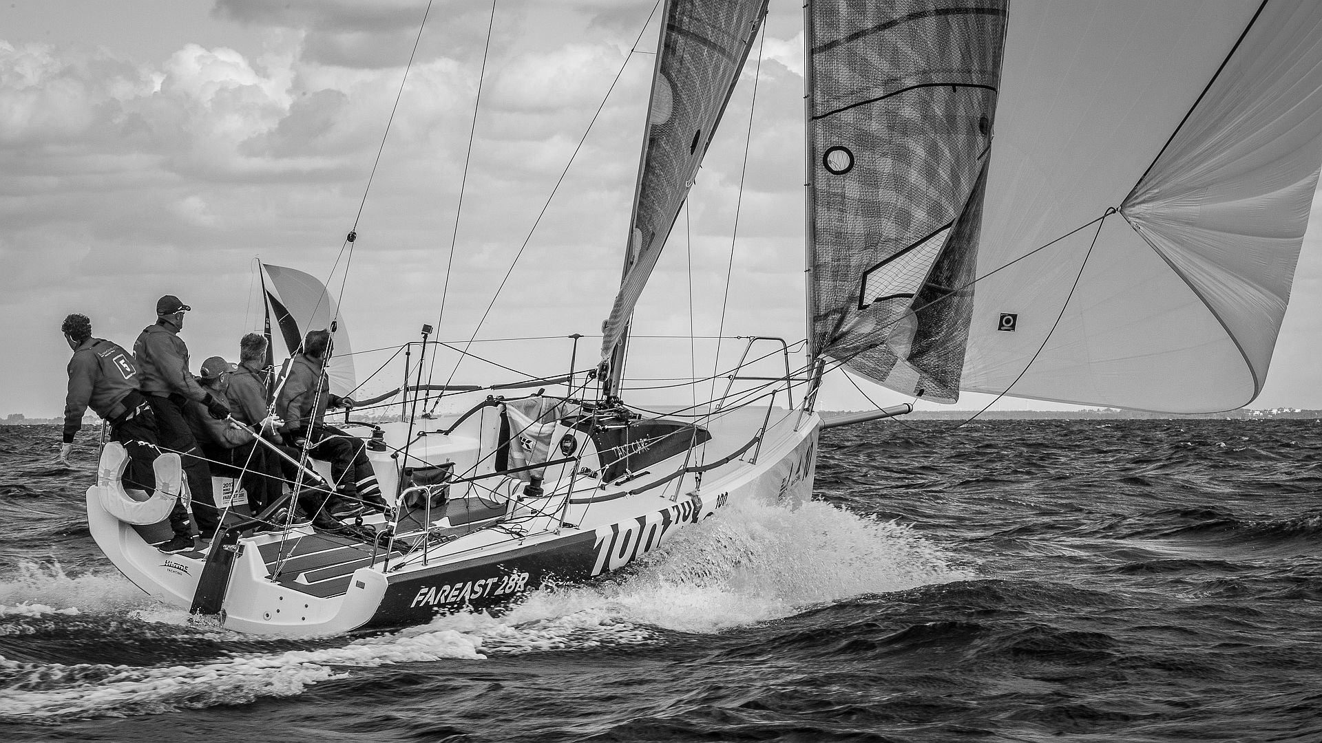 Fareast 28R racing yacht sailing under spinnaker in fresh conditions