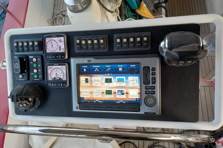 Navigation instruments and controls at a yacht helm